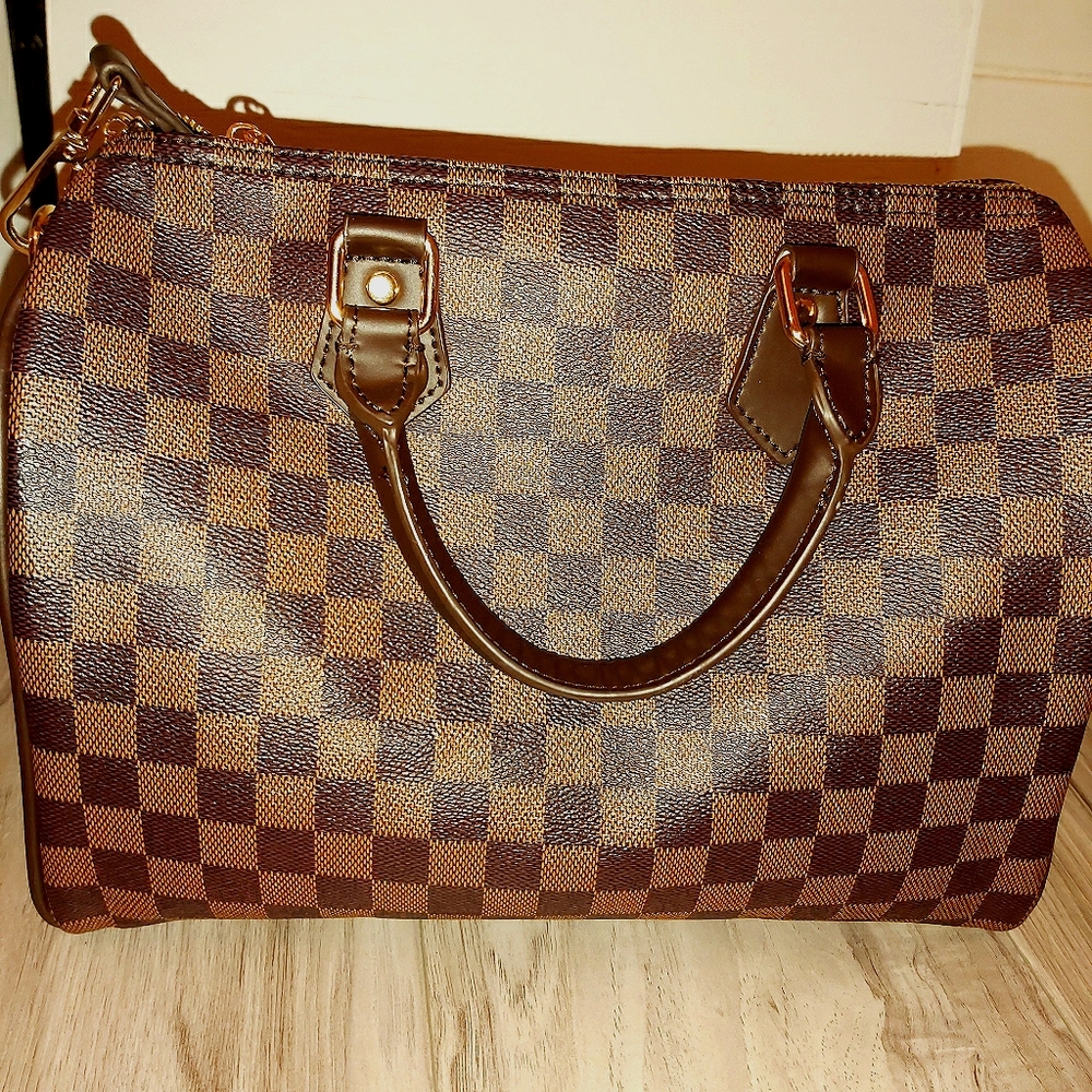 Handbag with lock and key